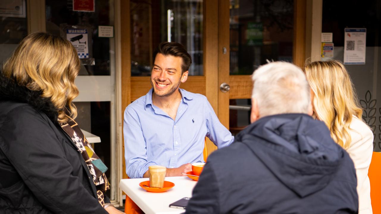 Jack Batty drinking coffee with family shortly after winning the Dulwich by-election in 2022. Picture: Morgan Sette