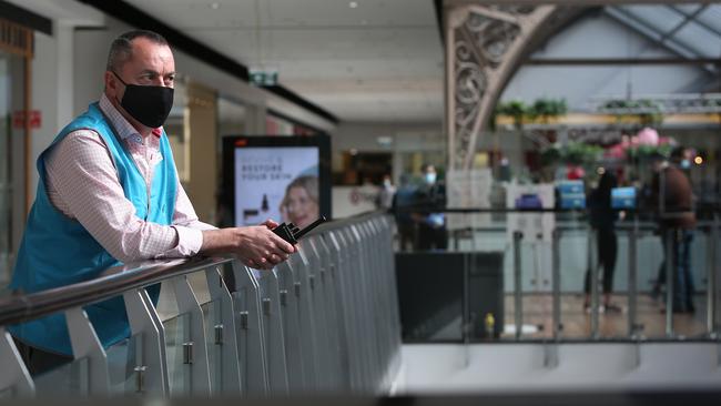 Senior facility manager Nathan Swale wears a face mask at Broadway Shopping Centre in Sydney. Mirvac Retail has mandated masks be worn by all their staff in shopping centres. Picture: Lisa Maree Williams/Getty