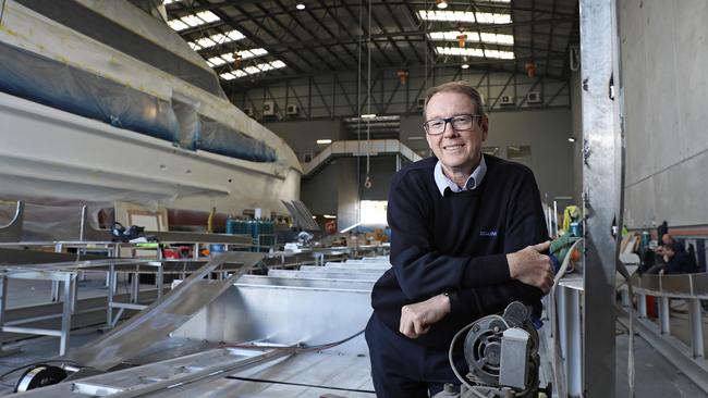 Sealink’s chief executive and managing director Jeff Ellison in front of the beginning of a new passenger and car ferry for Bruny Island being built by Richardson Devine Marine in Goodwood. Picture: LUKE BOWDEN