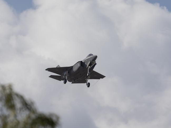 A Royal Australian Air Force F-35A Lightning II aircraft performs a flying display during the No. 75 Squadron family day at RAAF Base Tindal, near Katherine.