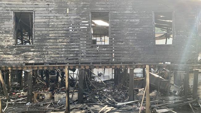 The charred remains of the house at Hamilton which was destroyed by fire last night. Photo: Isabella Magee