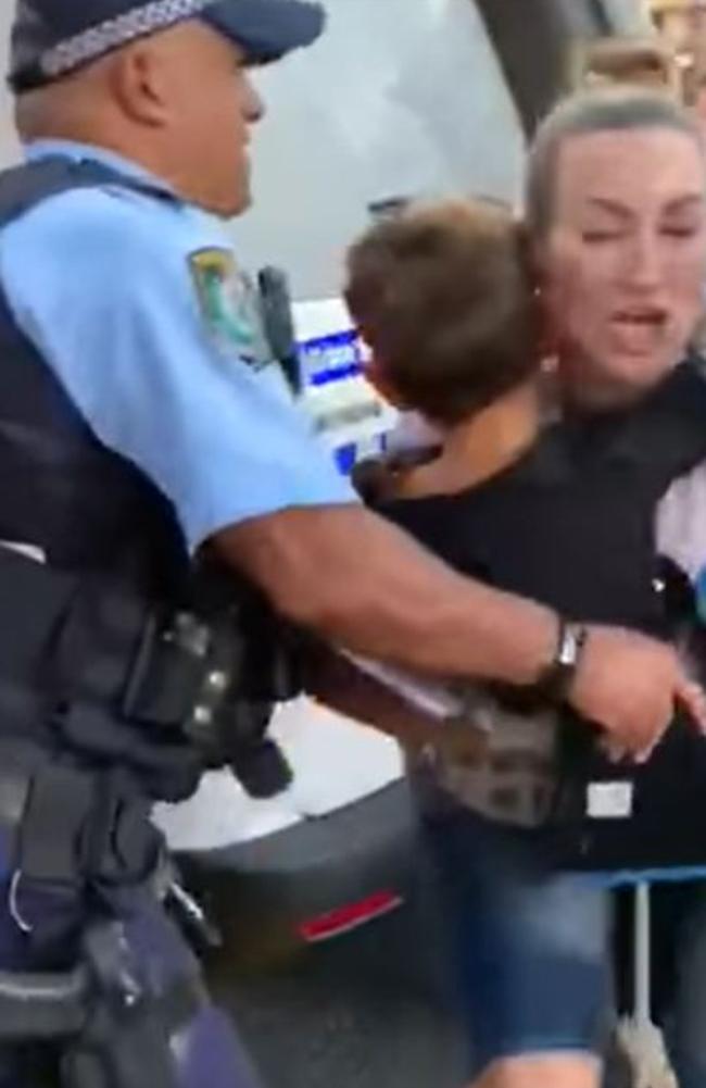 At one point, Ms Altakrity attempted to run away from the officers with her son in her arms. Picture: Facebook.