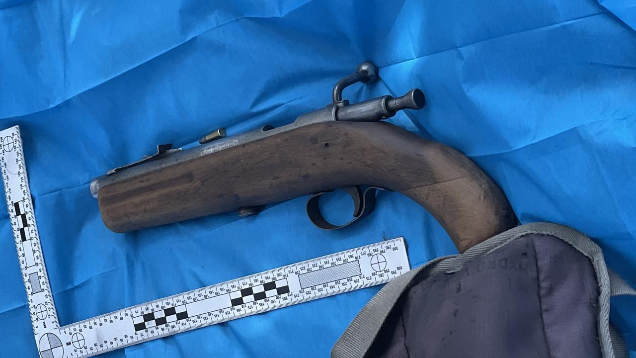 Police conducting a search near a Highfields property that was the scene of a siege found a loaded sawn-off .22 rifle.