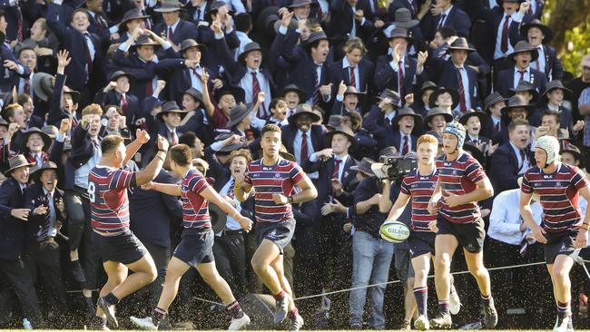 Players from TSS, The Southport School, take the field at Ross Oval, Nudgee College. Picture: Mark Cranitch