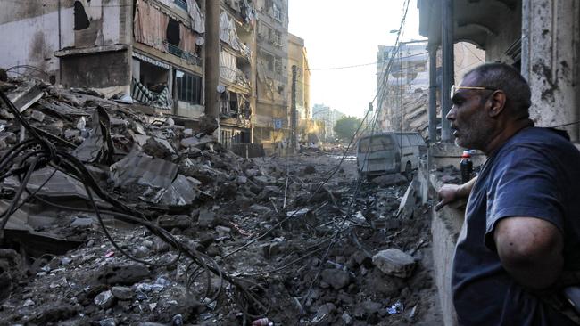 A resident stares at the destruction in the aftermath of an Israeli strike on the neighbourhood of Mreijeh in Beirut’s southern suburbs on October 4, 2024. (Photo by AFP)