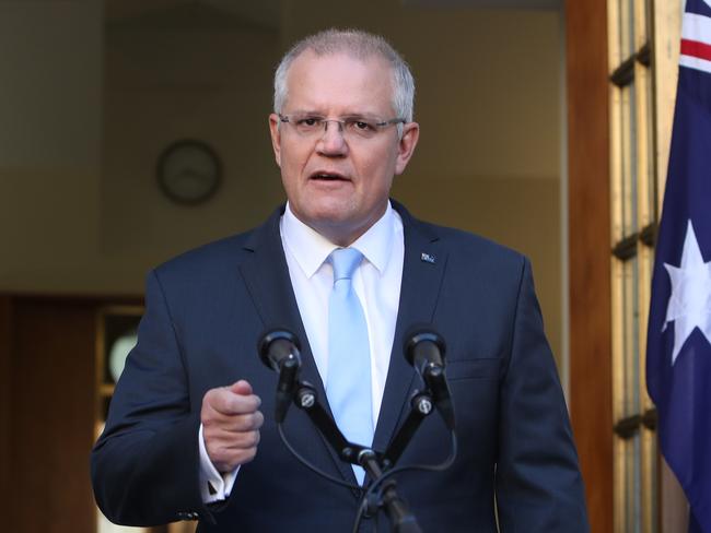 Prime Minister Scott Morrison during a press conference at Parliament House in Canberra, where he clenched his fist. Picture Kym Smith