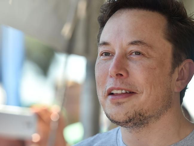 (FILES) In this file photo taken on July 22, 2018 SpaceX, Tesla and The Boring Company founder Elon Musk attends the 2018 SpaceX Hyperloop Pod Competition, in Hawthorne, California on July 22, 2018. - Tesla chief executive Elon Musk disclosed on August 13, 2018, he was in talks with Saudi Arabia's sovereign wealth fund and other investors to take the electric automaker private. The revelation comes days after Musk's claim in an August 7 Twitter post that financing for a deal to take Tesla private had been "secured." (Photo by Robyn Beck / AFP)