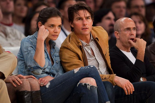 Looking very casual and laid back ... Katie Holmes and Tom Cruise watch the Los Angeles Lakers v Minnesota Timberwolves NBA basketball game in Los Angeles, California in 2010. Photo: AP