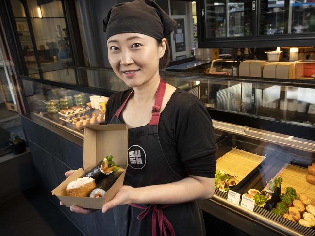 Sushi roller Gina Hsieh with compostable packaging at Sush. Picture: Chris Kidd