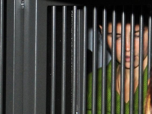 Amanda Knox behind bars for her sentencing on December 4, 2009 in Perugia. Picture: AFP