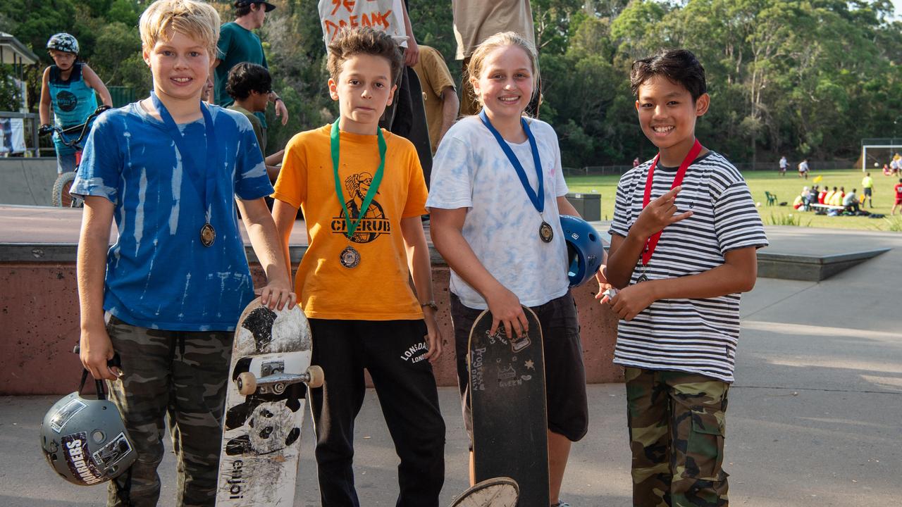 Caleb Fibbens 1st, Leo McDowell 3rd, Faith Finlay 1st &amp; Alessandro Tordesillas-Grapilon 2nd pose for a photo at Berowra skate park at the skate, scooter and BMX battle royale. (AAP IMAGE / MONIQUE HARMER)