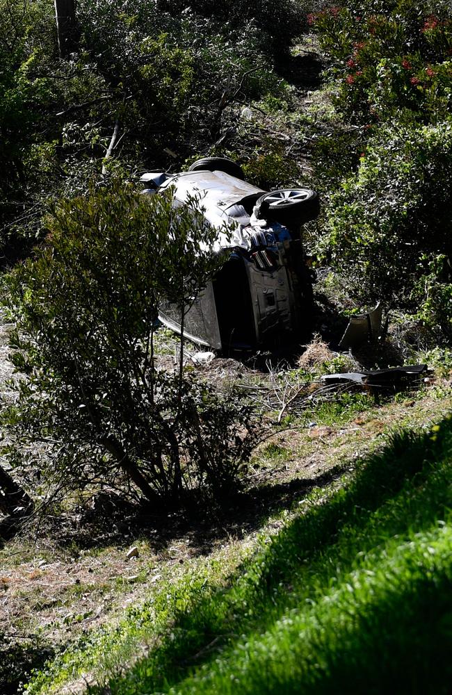 The vehicle driven by golfer Tiger Woods lies on its side in Rancho Palos Verdes, California. Picture: AFP