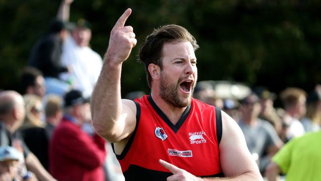 Steve Burlak of Romsey celebrates a goal during the RDFL footy grand final between Diggers Rest and Romsey played at Romsey on Sunday 20th September, 2015. Picture: Mark Dadswell