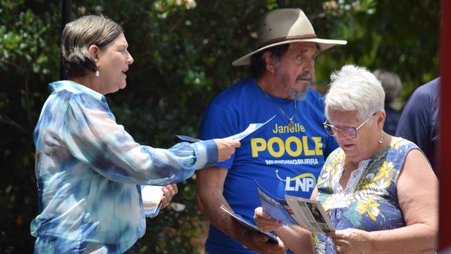 Mundingburra candidates Les Walker, Janelle Poole and Michael Pugh meet with early voters on October 14. Photo: Daniel Shirkie.