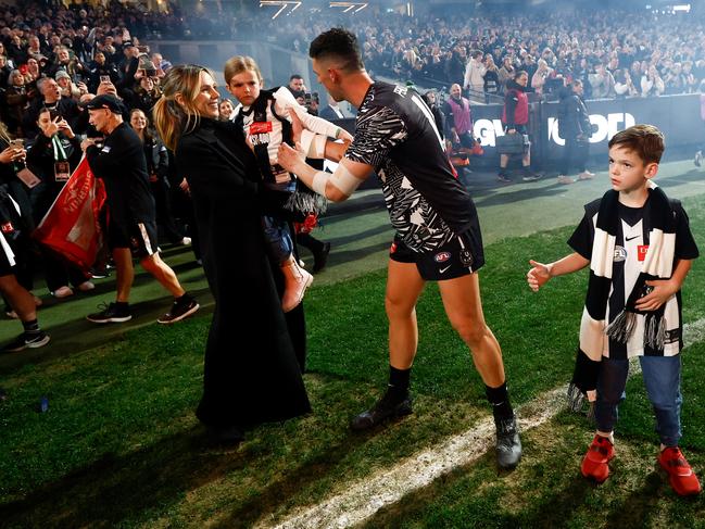 Pendlebury with son Jax, wife Alex and daughter Darcy pre-game. Picture: Michael Willson/AFL Photos