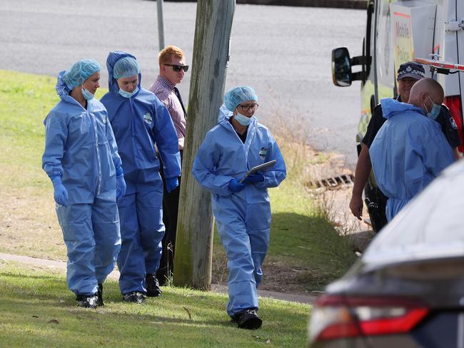 Forensic police at the scene of a domestic violence murder, Flinders Drive, Leichardt. Picture: Liam Kidston