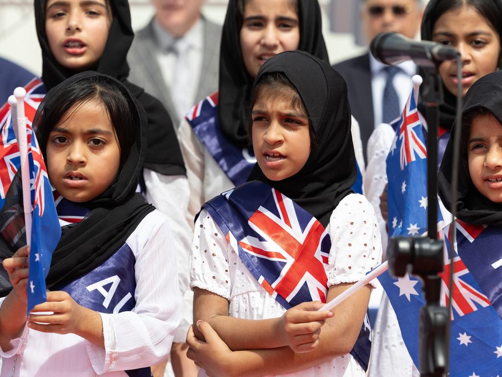 Children were holding up Australian flags at the ceremonies. Picture: NewsWire / Brendan Read