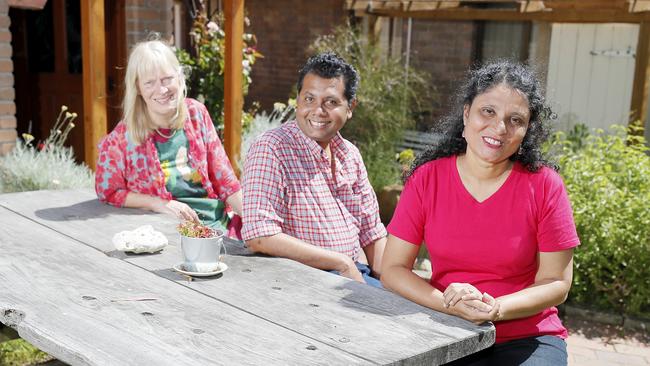 UTAS homestay host Christiane Smethurst, left, with international law student Sunethra Goonetilleke and her husband Nandana Talagune. Picture: RICHARD JUPE