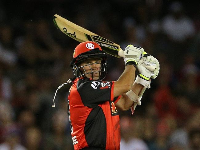 Brad Hodge of the Melbourne Renegades loses his earpiece as he cuts during the BBL game between Melbourne Renegades and Brisbane Heat at Etihad Stadium, Melbourne, Saturday, December 23, 2017. (AAP Image/ Hamish Blair) NO ARCHIVING, EDITORIAL USE ONLY