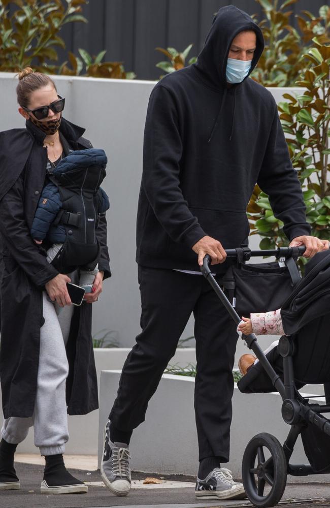 Buddy pushes the pram as the family heads to the park. Picture: Media Mode