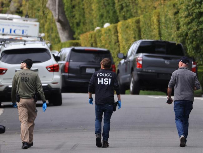 Homeland Security Investigations agents are seen outside the home of US producer and musician Sean ‘Diddy’ Combs in Los Angeles on March 25, 2024. Picture: David Swanson / AFP.