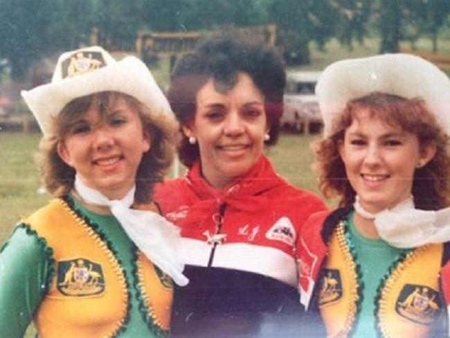 Lyndal Johns (centre) was the first cheerleading coach for the Parramatta Eels cheer squad, the Cumberland Cowgirls