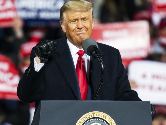 US President Donald Trump speaks to supporters during a rally in Pennsylvania. Mr Trump is doubling down on opponent Joe Biden despite trailing him in the polls. Picture: AFP