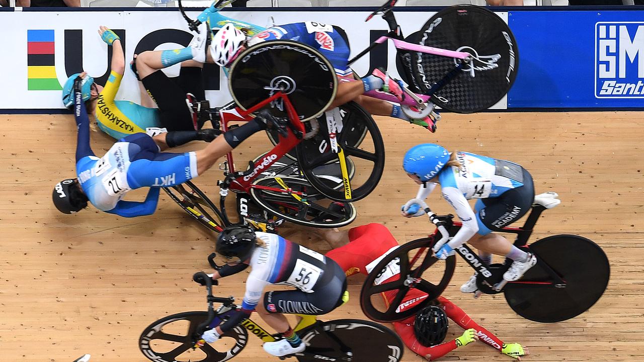 Riders crash during the women's Omnium Scratch race at the Tissot UCI Track Cycling World Cup at the Anna Meares Velodrome in Brisbane. (AAP Image/Dan Peled)