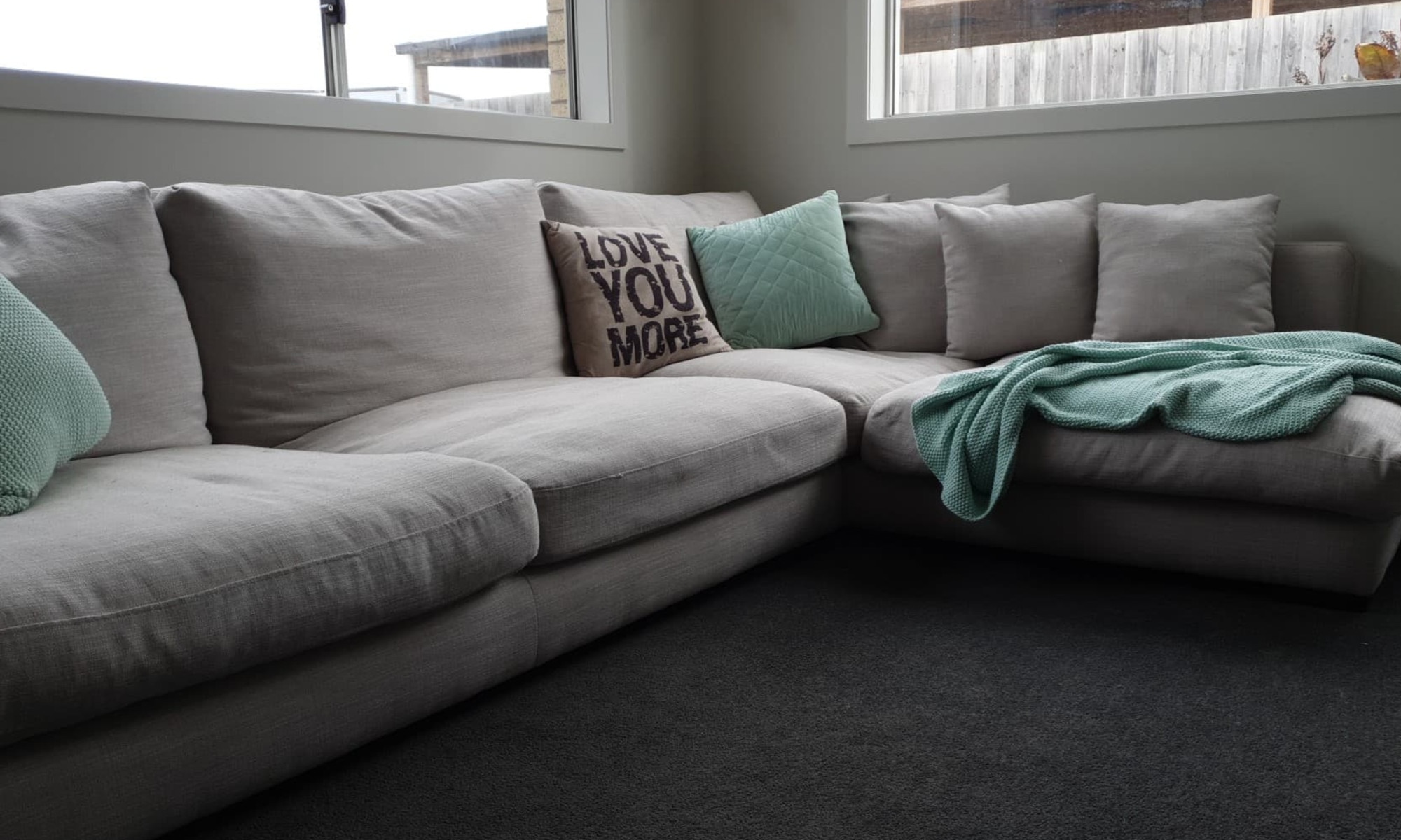 The couch now looks ‘incredible’ with Alex saying she made a $2549 saving thanks to Aldi. Picture: Supplied