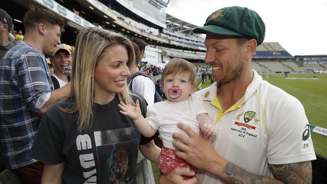 James Pattinson celebrates Australia’s First Test victory over England with his wife Kayla and daughter Lilah. Picture: Getty Images