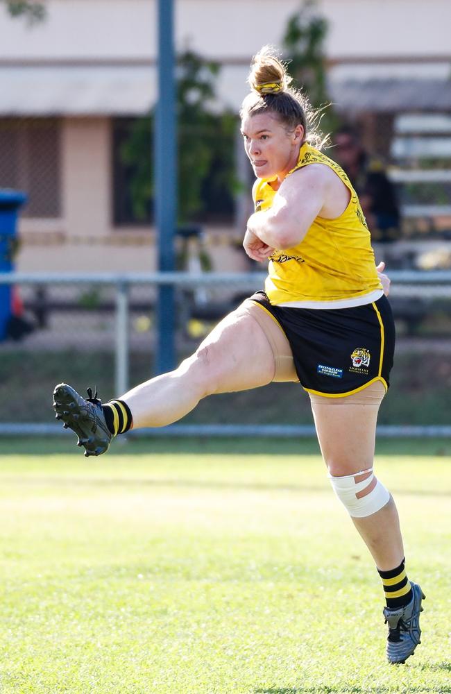 Nightcliff captain Hannah Turnbull boots the ball forward in the 2023-24 NTFL season. Picture: Celina Whan / AFLNT Media