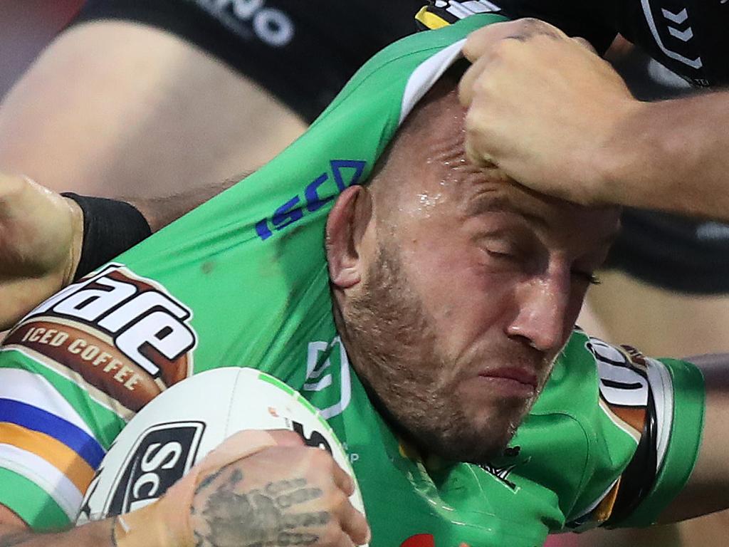 Canberra's Josh Hodgson is tackled by Penrith's Reagan Campbell-Gillard during the Penrith v Canberra NRL match at Panthers Stadium, Penrith. Picture: Brett Costello