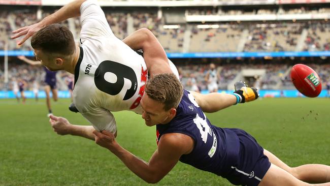 Robbie Gray is slammed into the turf by Ryan Nyhuis.