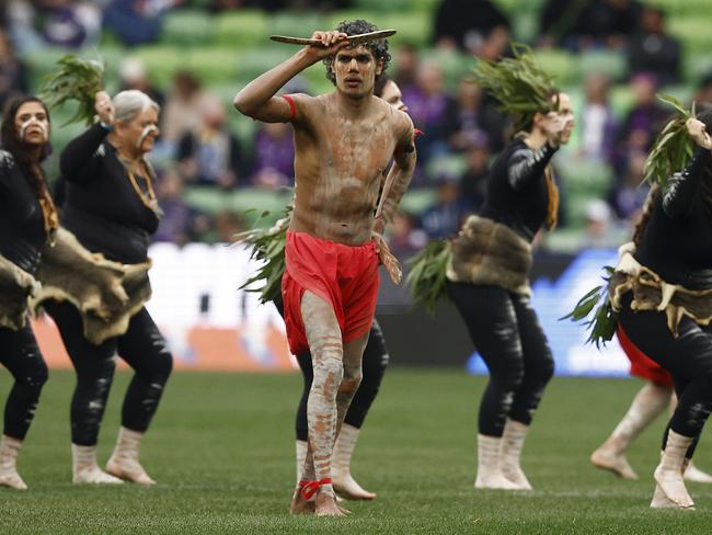 Indigenous dancers perform during a Welcome to Country before the match between Melbourne Storm and Cronulla Sharks at AAMI Park in June. Picture: Daniel Pockett