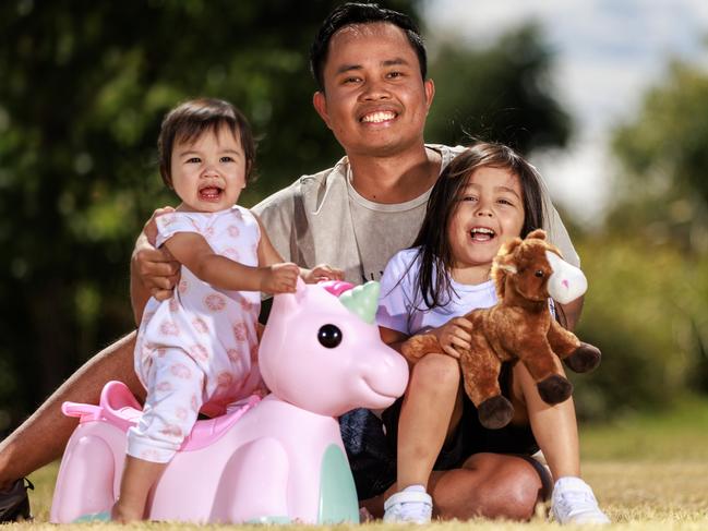 All-Star Mile 2023 owner ambassador Eko Budi with his kids, Arie, 4, and Anisa, 1. Picture: David Geraghty