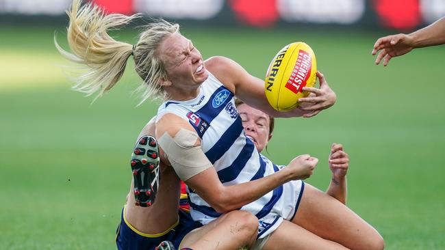 Phoebe McWilliams cops a heavy tackle against the Crows. Picture: AAP Images