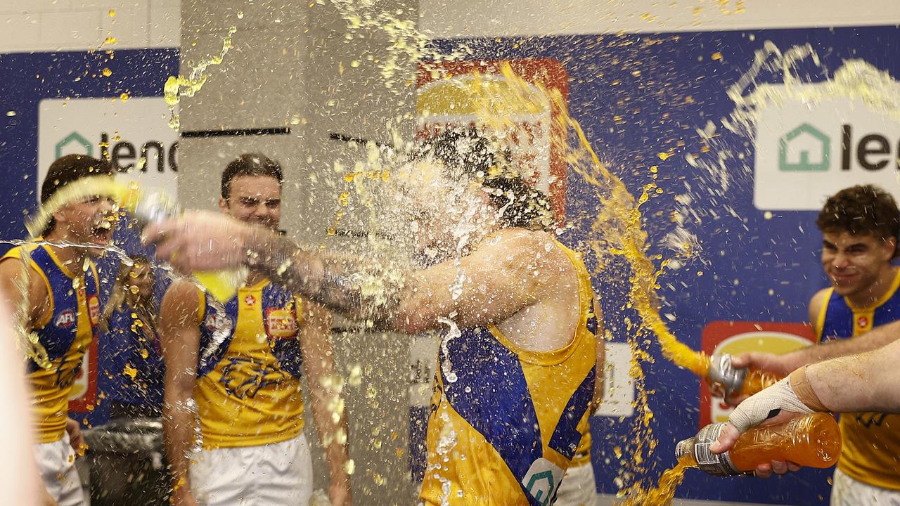 West Coast players celebrate their third win of the season. Picture: Daniel Pockett/Getty Images