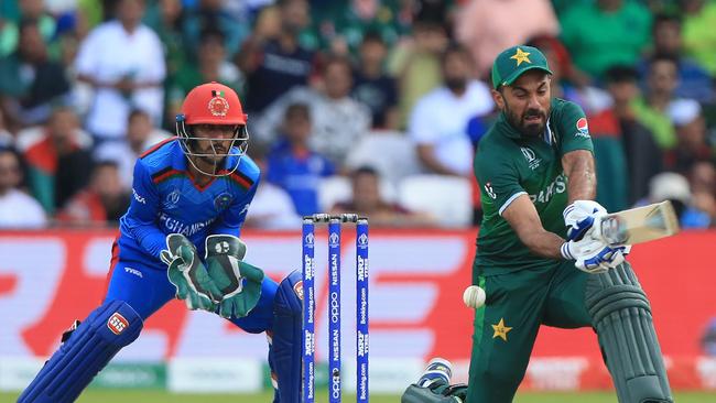 Pakistan's Wahab Riaz (R) attempts a reverse sweep during his crucial cameo. Picture: AFP