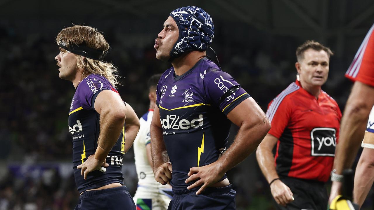 MELBOURNE, AUSTRALIA - MARCH 16: Jahrome Hughes of the Storm reacts after tackling Marcelo Montoya of the Warriors to prevent a try to New Zealand during the round two NRL match between Melbourne Storm and New Zealand Warriors at AAMI Park, on March 16, 2024, in Melbourne, Australia. (Photo by Daniel Pockett/Getty Images)