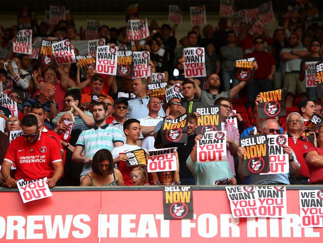 LONDON, ENGLAND - MAY 07: Charlton Athletic supporters protest against owner Roland Duchatelet prior to the Sky Bet Championship match between Charlton Athletic and Burnley on May 7, 2016 in London, United Kingdom. (Photo by Charlie Crowhurst/Getty Images)
