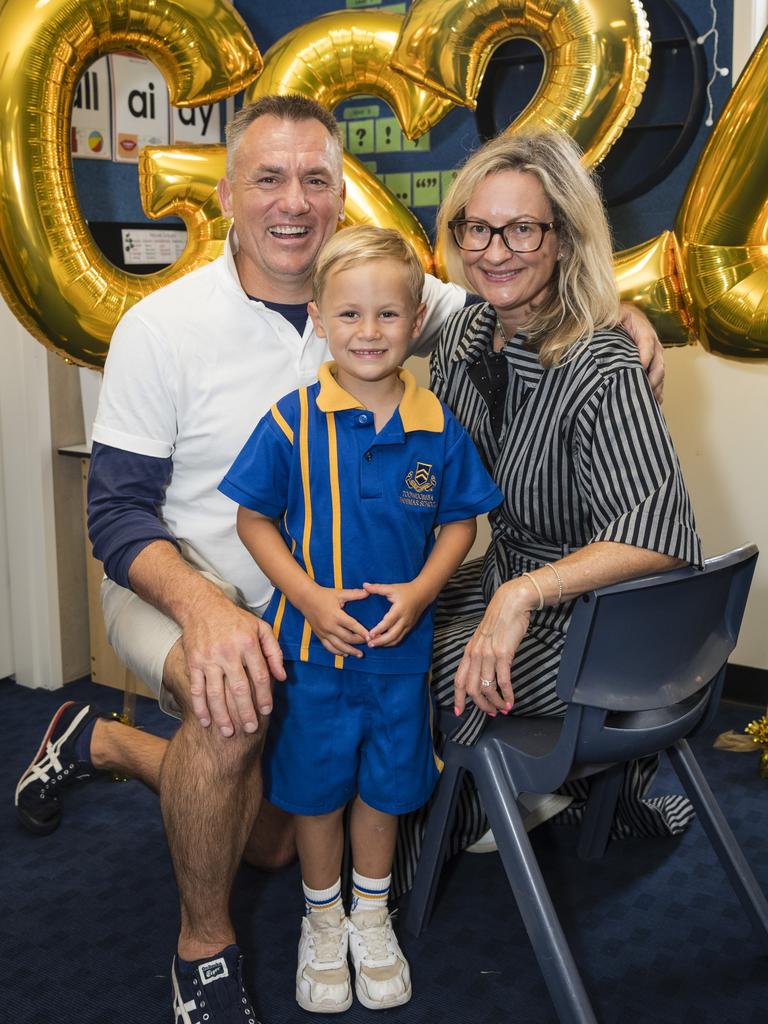 Toowoomba Grammar School Prep student Charlie Grant with parents Mathew and Anna Grant on the first day of school, Tuesday, January 23, 2024. Picture: Kevin Farmer