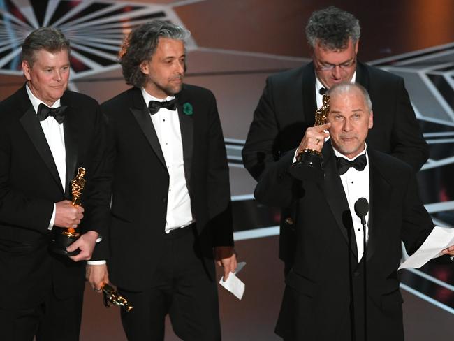 Visual effects artists Richard R. Hoover, Paul Lambert, Gerd Nefzer, and John Nelson accept Best Visual Effects for Blade Runner 2049. Picture: Getty Images