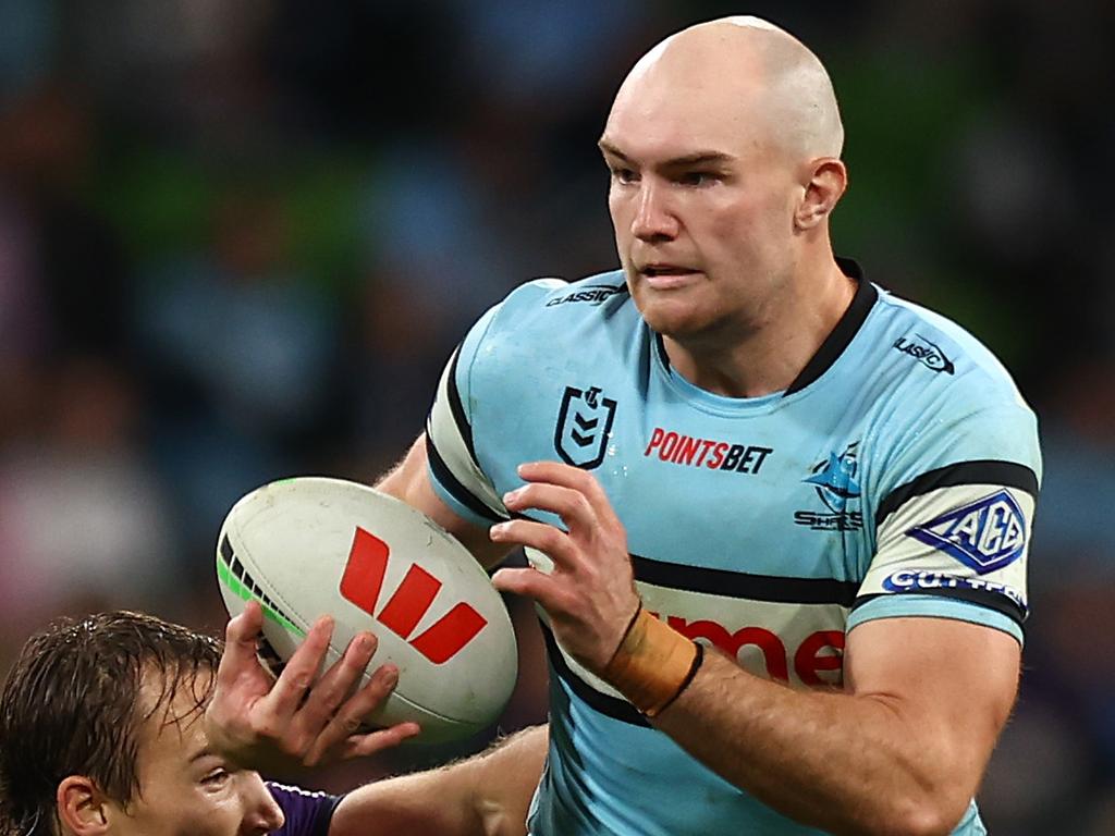 Tom Hazelton is being chased by the Dragons. Picture: Graham Denholm/Getty Images