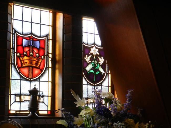 Stain glass window inside the church donated by parishioners.