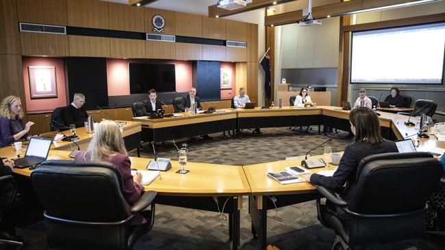 David Grace who will have to apologise at tonight's council meeting for threatening to put Cr Paula Wriedt on her tail was absent tonight. Cr Paula Wriedt is in a Blue jacket. Mayor Dean Winter is also shown at the meeting. Picture Eddie Safarik