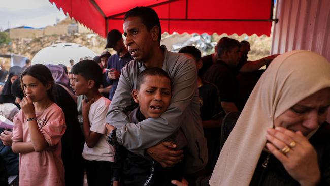 A boy mourns for a loved one killed in Israeli strikes on Jabalia, at the Indonesian hospital in Beit Lahia. Picture: AFP