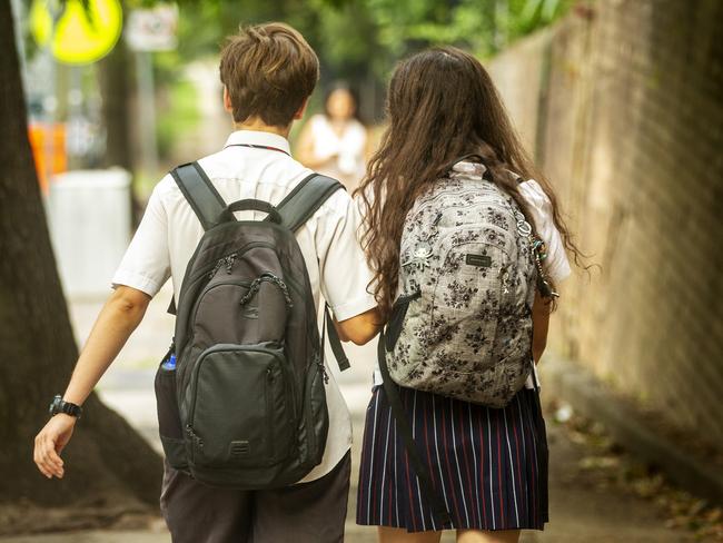 SYDNEY, AUSTRALIA - JANUARY 29: Students are seen arriving for school in Chatswood on January 29, 2020 in Sydney, Australia. The education department has asked for students who have recently travelled to China to be kept home from school until after the 14-day incubation period for coronavirus has ended. The precautionary measure was announced by the NSW Health Minister as the death toll from coronavirus in China stands at 106 people, with 4,515 people are infected, while thousands more are under observation. Four cases have been confirmed in NSW. (Photo by Jenny Evans/Getty Images)