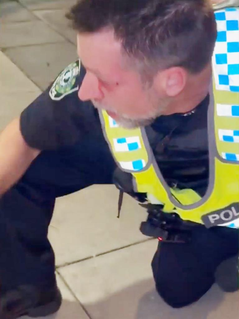 An SA Police officer following the alleged assault. Picture: 7NEWS Adelaide