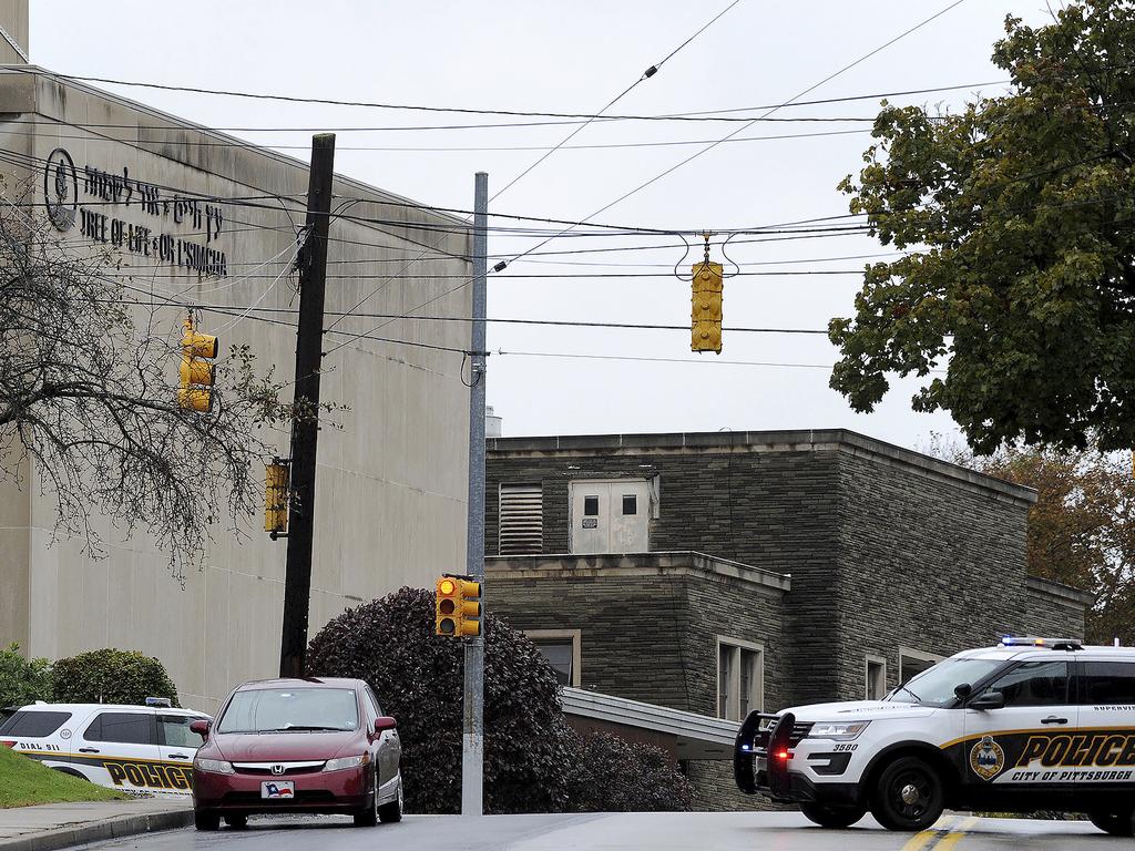 Police respond to a shooting at the Tree of Life synagogue on Wildins Avenue in the Squirrel Hill neighbourhood of Pittsburgh. Picture: AP