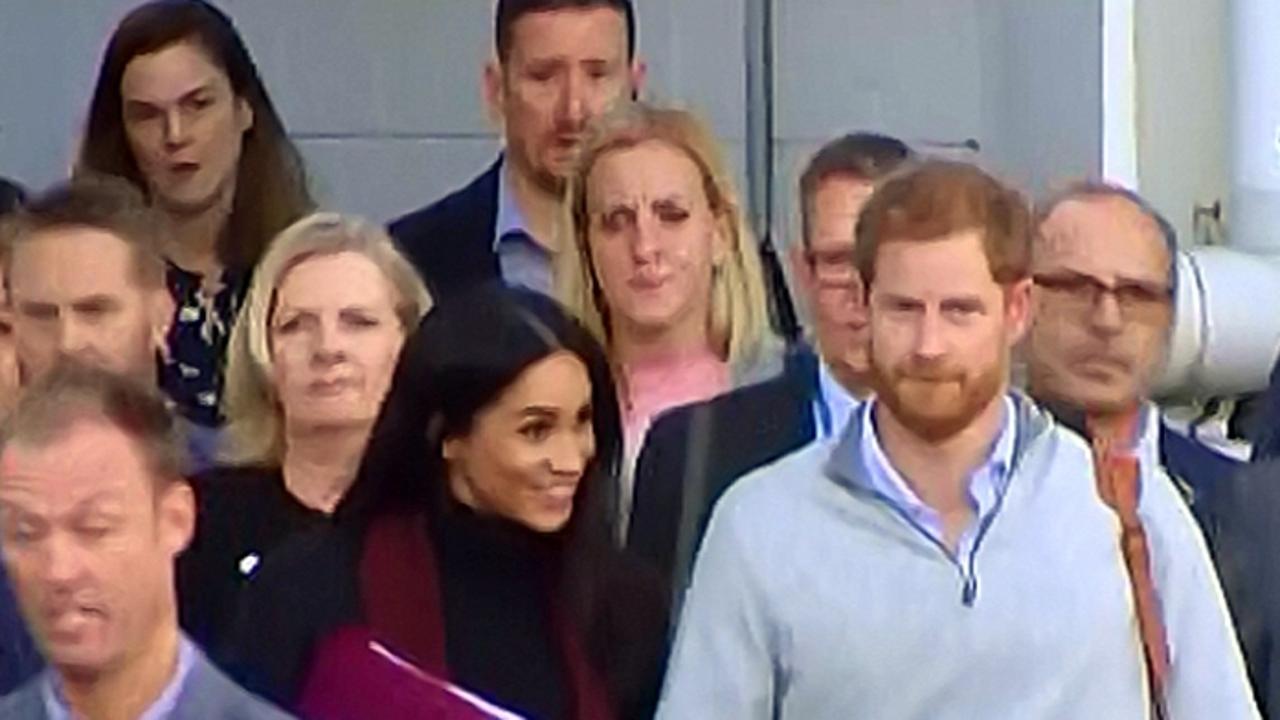 Prince Harry and Meghan Markle arrive into Sydney Airport for their Australian tour. Samantha Cohen (back, left) is part of their entourage. Picture: Sunrise.